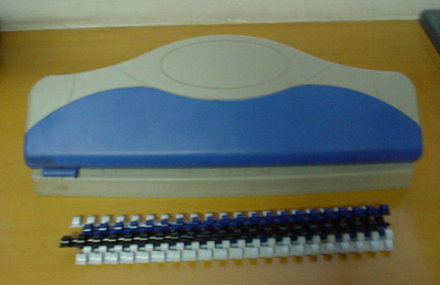 Papierbindemaschine aus Kunststoff