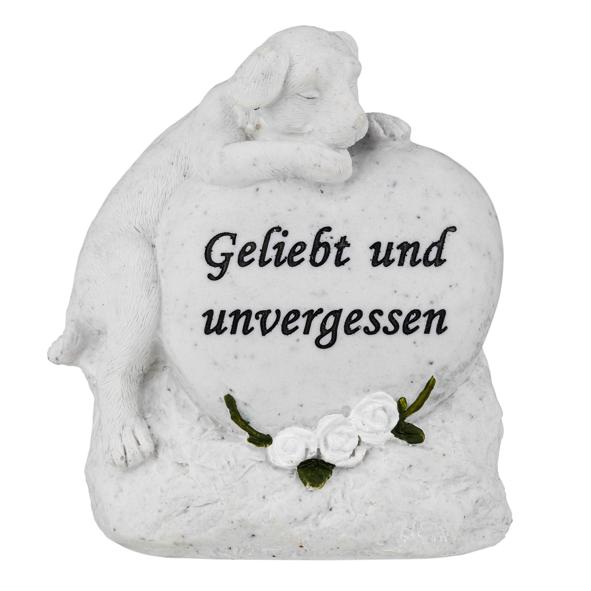 Gedenkstein liegender Hund auf Herz
