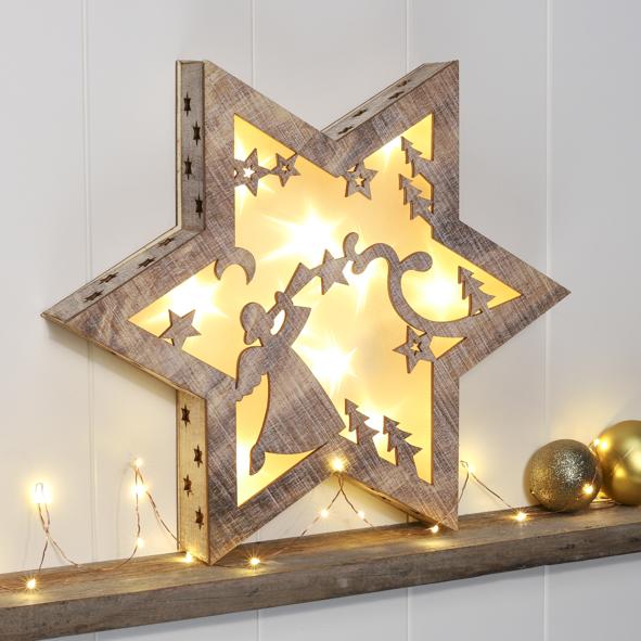 Holzstern mit Weihnachtskulisse