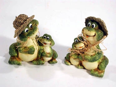 Frosch mit Strohhut und Kind