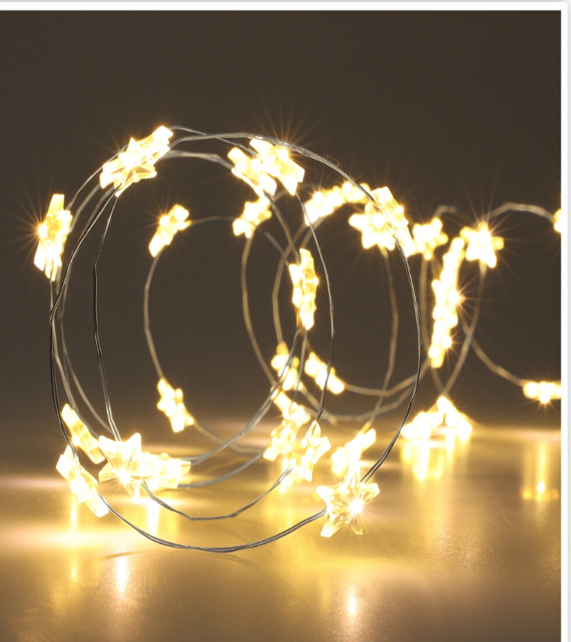 Kupferlichterkette mit Sternen