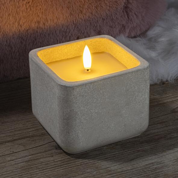 LED Kerze in einer Zementschale